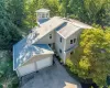 This home’s distinctive design comes to life from this angle, with the unique “Crow’s Nest” rising above and adding character, charm, and a memorable architectural touch. This home’s distinctive design comes to life from this angle, with the unique “Crow’s Nest” rising above and adding character, charm, and a memorable architectural touch.
