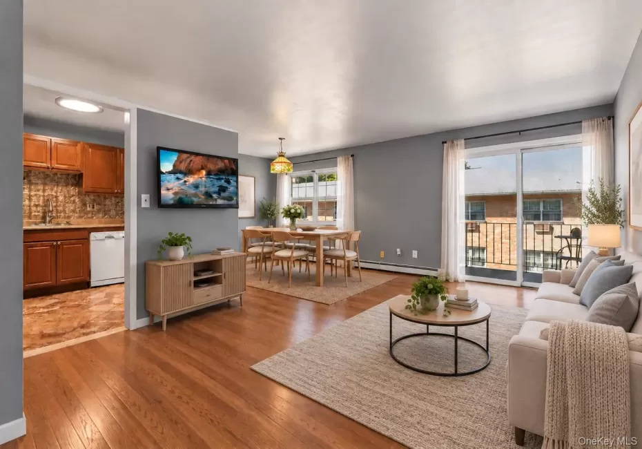 Virtually Edited Living Area: Living Area, Dining Area, Hardwood Floors Under Carpet. Virtually Edited Living Area: Living Area, Dining Area, Hardwood Floors Under Carpet.
