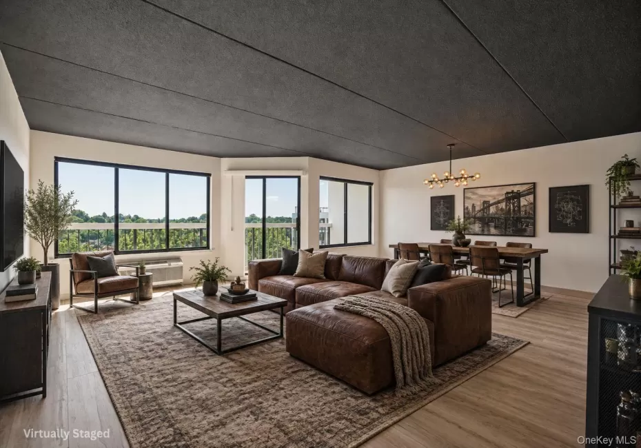 This living room is a virtually staged, but the space is real, the windows are real and this beautiful year round view is yours This living room is a virtually staged, but the space is real, the windows are real and this beautiful year round view is yours