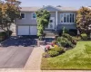 Professionally Landscaped, Paver Walkway to Staircase with Updated Railing Professionally Landscaped, Paver Walkway to Staircase with Updated Railing