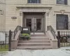 Doorway to property featuring brick siding Doorway to property featuring brick siding