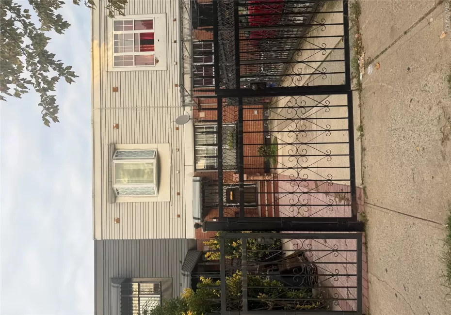 Gated front yard with parking Gated front yard with parking