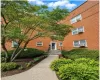 Tappan Manour Condominium exterior — brick building, entrance, and landscaped walkway at 320 South Broadway. Tappan Manour Condominium exterior — brick building, entrance, and landscaped walkway at 320 South Broadway.