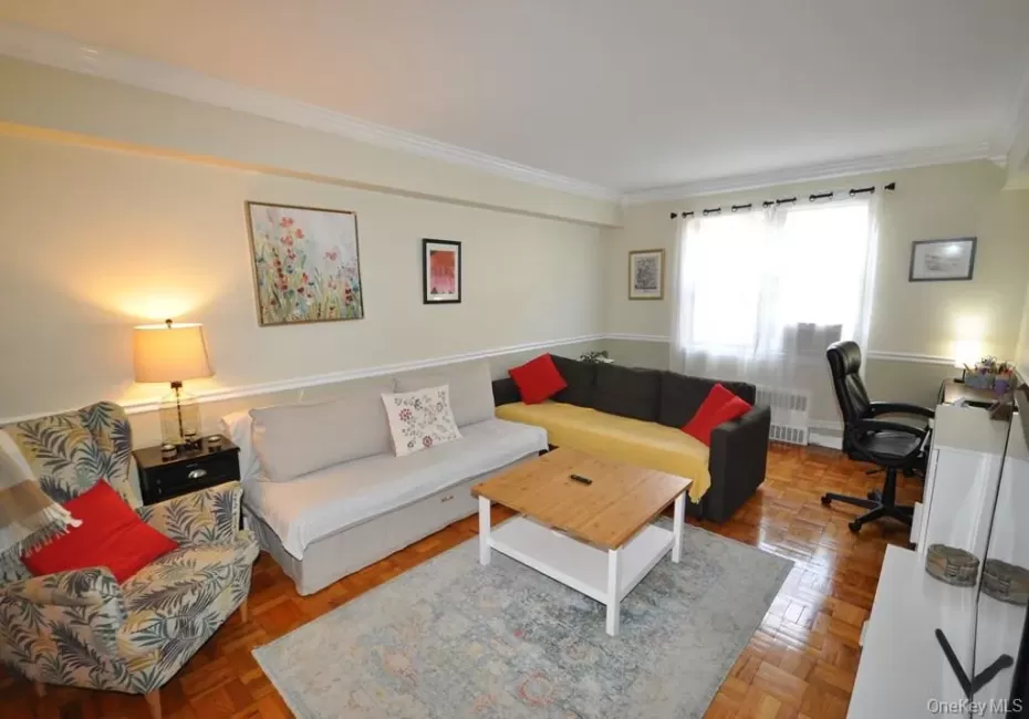 Large Living Room opens to the Dining area and has parquet floors. Large Living Room opens to the Dining area and has parquet floors.