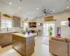 Kitchen with a center island, open floor plan, recessed lighting, healthy amount of natural light, and tasteful backsplash Kitchen with a center island, open floor plan, recessed lighting, healthy amount of natural light, and tasteful backsplash
