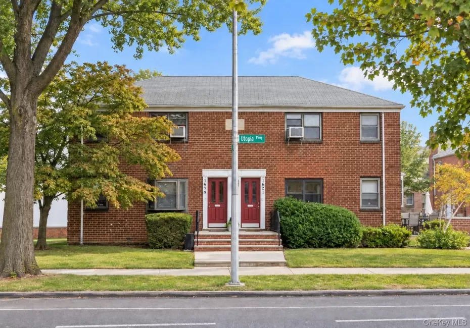 Welcome Home!Brick exterior, dual entryways, symmetrical front facade, concrete steps, and landscaped front yard Welcome Home!Brick exterior, dual entryways, symmetrical front facade, concrete steps, and landscaped front yard