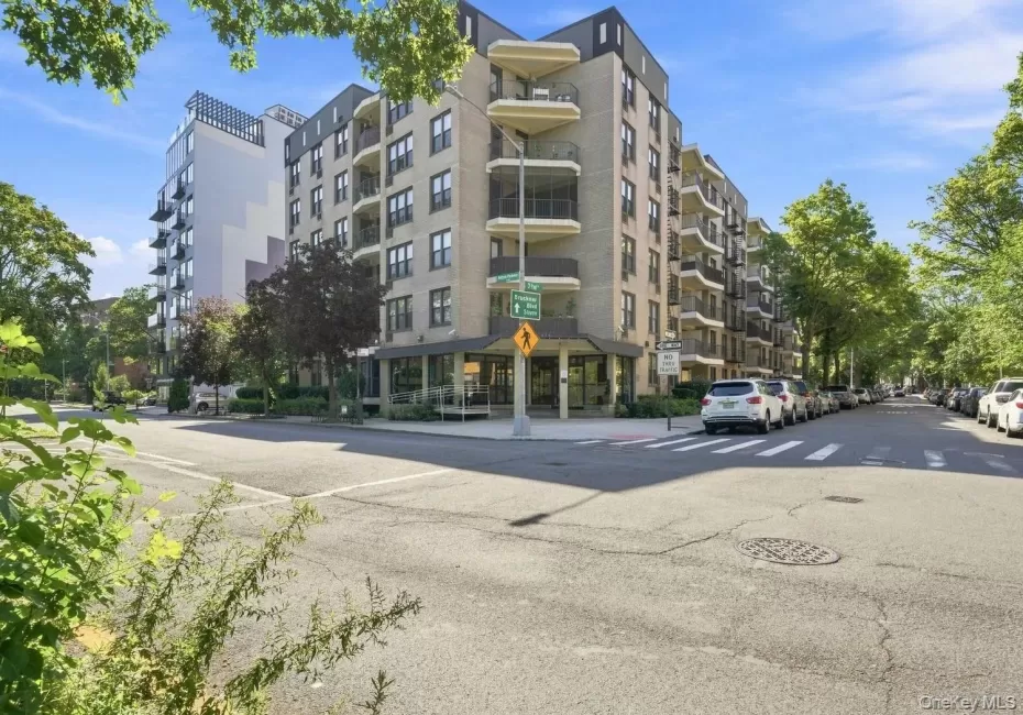 Multi-story residential building with private balconies and a ground-floor entrance Multi-story residential building with private balconies and a ground-floor entrance