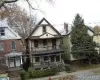 View of front of house featuring a balcony View of front of house featuring a balcony