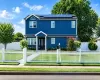 Two-story residence featuring a new exterior siding, trim details. Two-story residence featuring a new exterior siding, trim details.