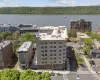 Drone / aerial view of a nearby body of water and a forest Drone / aerial view of a nearby body of water and a forest