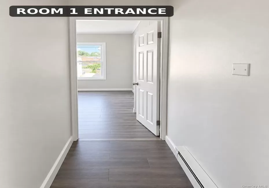 Wood-finish flooring throughout, white interior doors, and crisp white walls Wood-finish flooring throughout, white interior doors, and crisp white walls