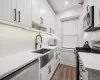 Newly Renovated Kitchen w/ White Cabinetry, Stainless Steel Appliances. Newly Renovated Kitchen w/ White Cabinetry, Stainless Steel Appliances.