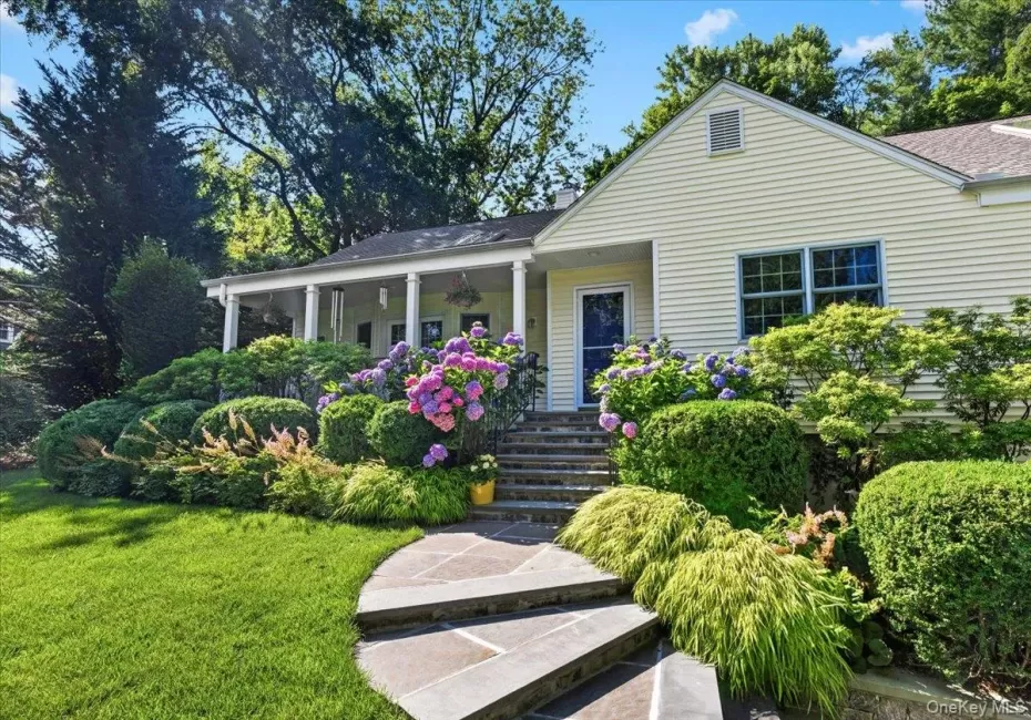 Stone walkway leading to gracious 4BR/3Bth, updated with many upgrades Stone walkway leading to gracious 4BR/3Bth, updated with many upgrades