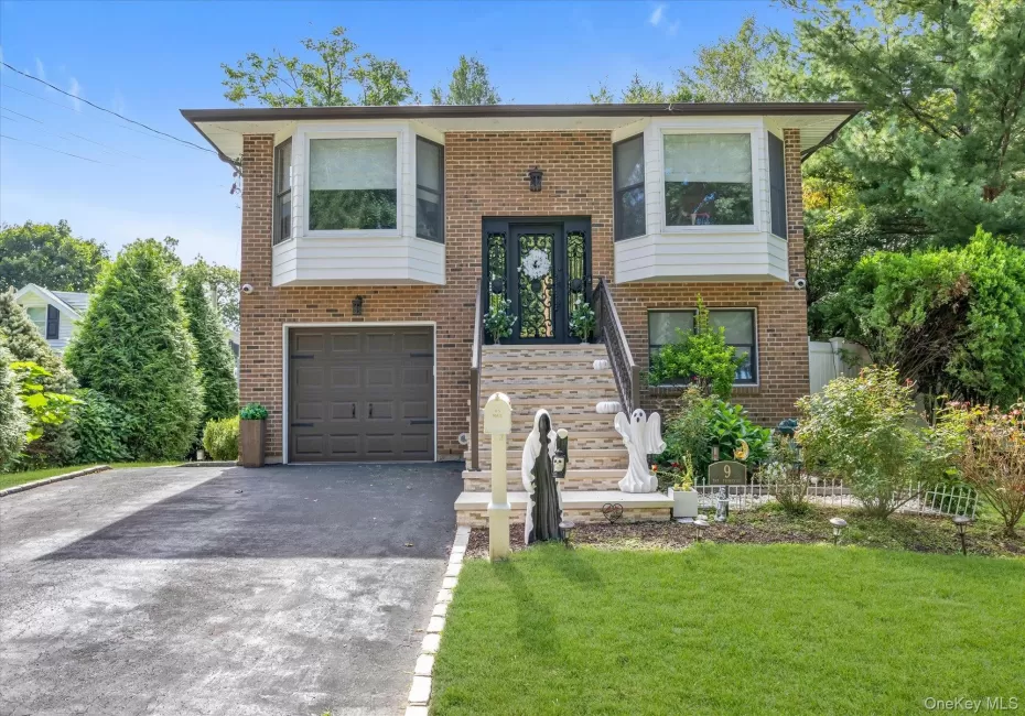 Brick & Cedar exterior. 2023: new roof, soffit's w/lighting, gutters replaced stairway, railings front door & garage door. Brick & Cedar exterior. 2023: new roof, soffit's w/lighting, gutters replaced stairway, railings front door & garage door.