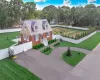 Property offers a circular driveway, plus an additional side driveway for added parking and convenience. Property offers a circular driveway, plus an additional side driveway for added parking and convenience.