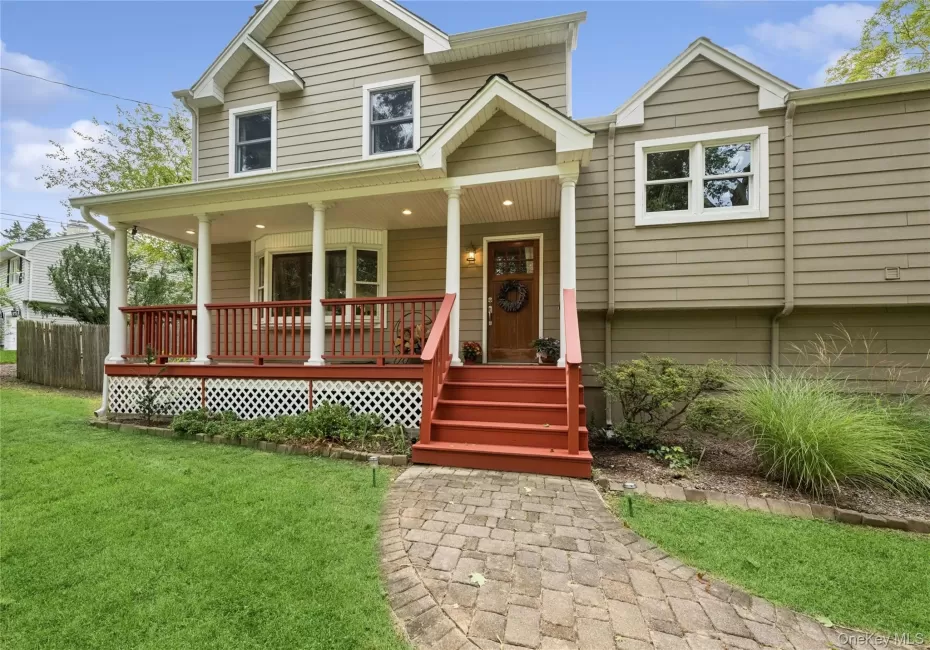 Exterior front, with cement board siding and large front deck Exterior front, with cement board siding and large front deck
