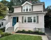 View of front of house with landscaping and a front yard View of front of house with landscaping and a front yard