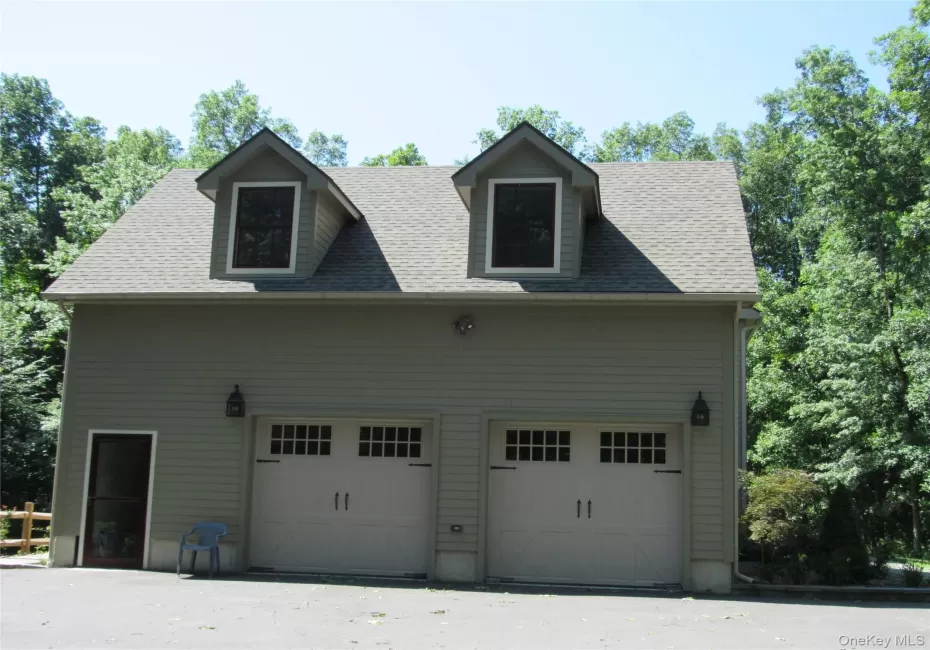 Apartment is above garage. Entrance on the side of garage facing yard. Apartment is above garage. Entrance on the side of garage facing yard.