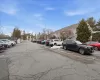 Uncovered parking lot with a residential view Uncovered parking lot with a residential view