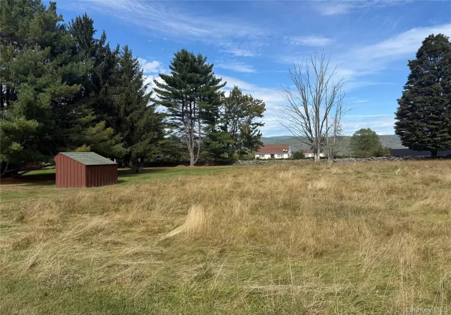 View of lot featuring a shed and a view of countryside View of lot featuring a shed and a view of countryside