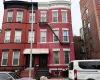 Italianate house featuring brick siding Italianate house featuring brick siding