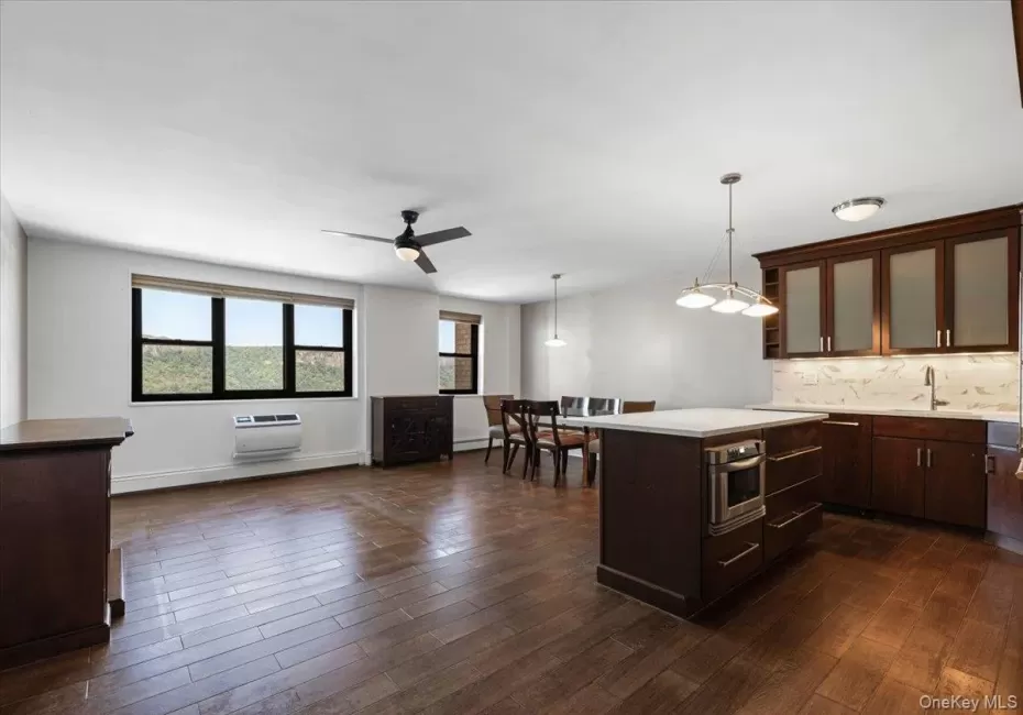 Open Floor plan includes gourmet kitchen w/center island, dining area, living room & beautiful river views Open Floor plan includes gourmet kitchen w/center island, dining area, living room & beautiful river views
