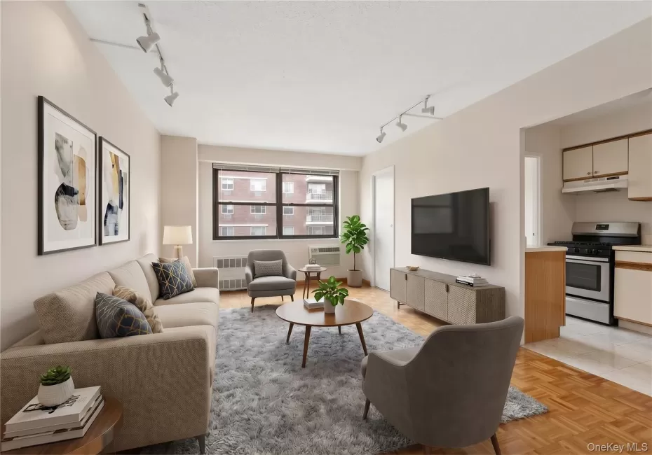 Large living room with oversized windows and hardwood floors Large living room with oversized windows and hardwood floors