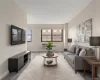 Large living room with an L shaped sleeping alcove Large living room with an L shaped sleeping alcove
