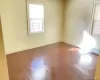 Wood-finish flooring with baseboard trim Wood-finish flooring with baseboard trim