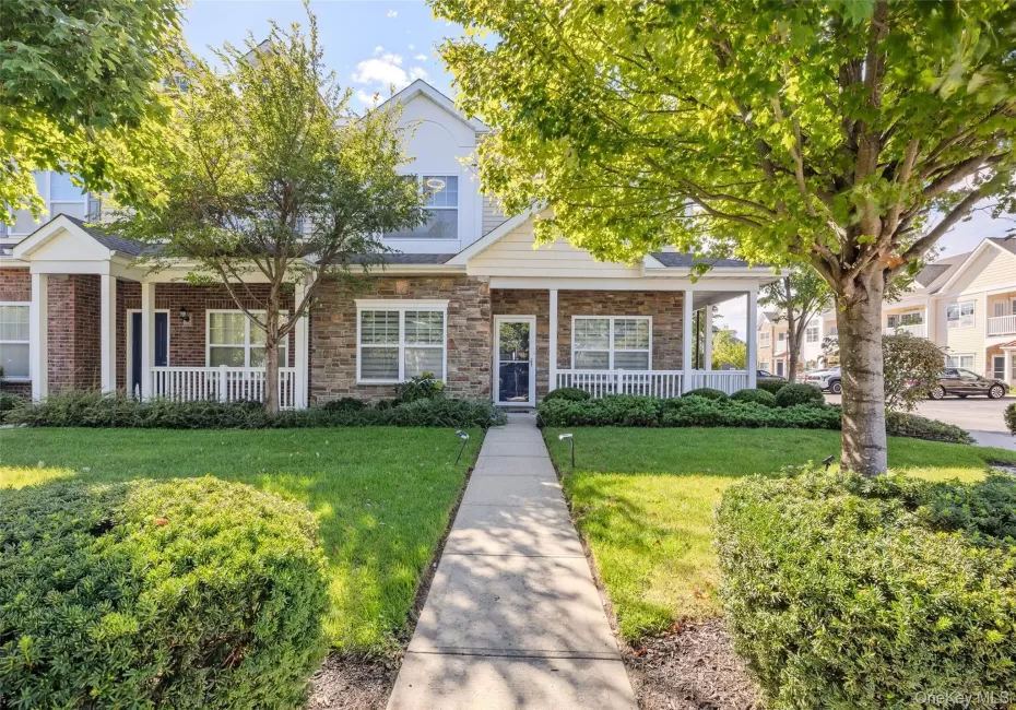 Stone and Brick Facade with Additional Entry Stone and Brick Facade with Additional Entry