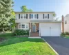 Front of home, driveway and 2 car garage with high ceilings Front of home, driveway and 2 car garage with high ceilings