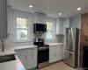 Large Updated Kitchen with lots of cabinets, stainless steel appliances . Large Updated Kitchen with lots of cabinets, stainless steel appliances .