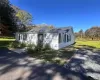 Outside view of the house. Parking to the right side Outside view of the house. Parking to the right side
