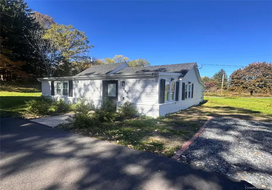 Outside view of the house. Parking to the right side Outside view of the house. Parking to the right side