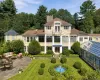 Complete with a Large Terrace and an Indoor/Outdoor Heated Conservatory Pool (Virtually Enhanced) Complete with a Large Terrace and an Indoor/Outdoor Heated Conservatory Pool (Virtually Enhanced)