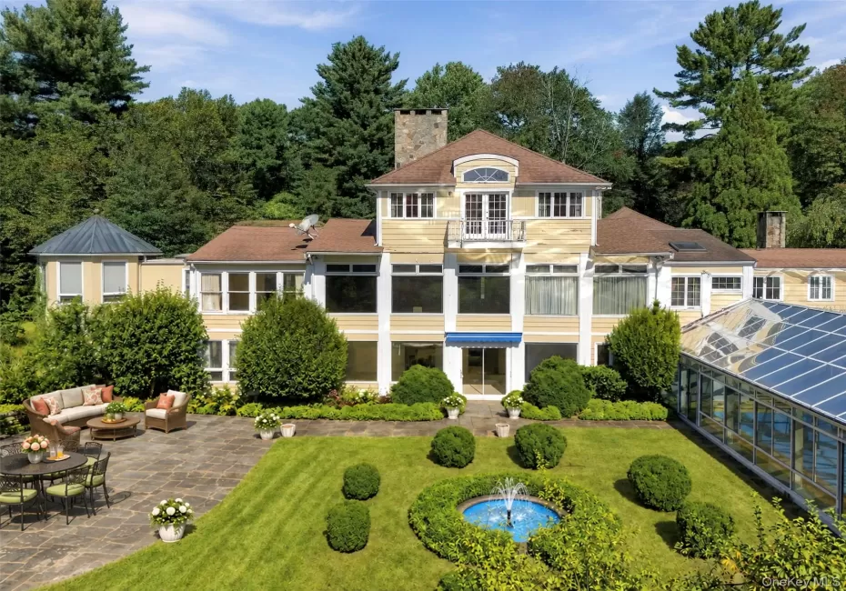 Complete with a Large Terrace and an Indoor/Outdoor Heated Conservatory Pool (Virtually Enhanced) Complete with a Large Terrace and an Indoor/Outdoor Heated Conservatory Pool (Virtually Enhanced)