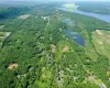 Bird's eye view featuring a water view Bird's eye view featuring a water view