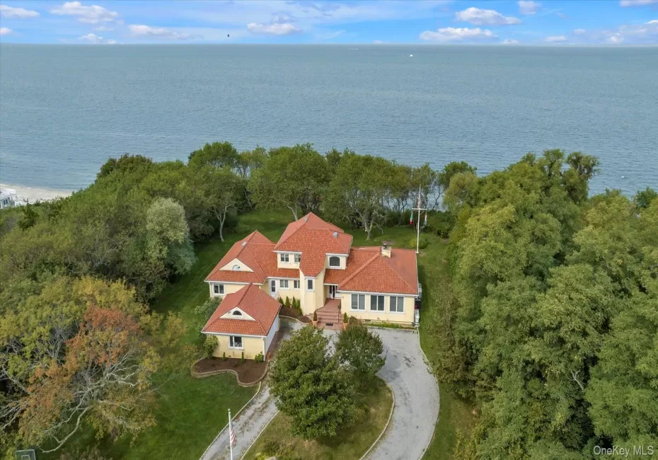 View from above of property with a nearby body of water View from above of property with a nearby body of water