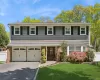 Professionally landscaped, outdoor lighting. New garage doors. Professionally landscaped, outdoor lighting. New garage doors.