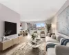 Virtually staged Living room featuring wood finished floors Virtually staged Living room featuring wood finished floors