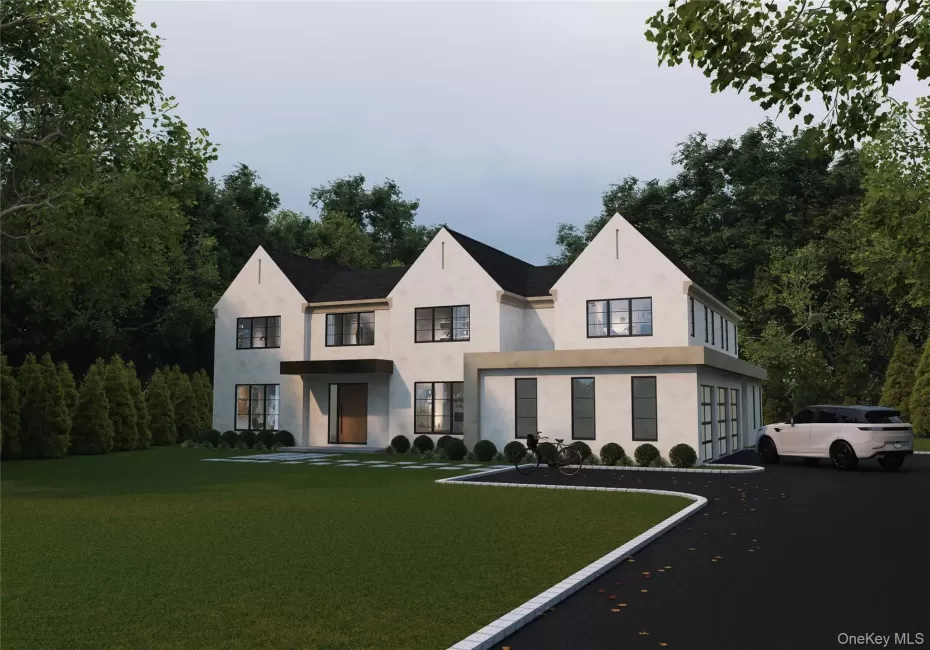 View of front of property with a front yard, asphalt driveway, stucco siding, and an attached garage View of front of property with a front yard, asphalt driveway, stucco siding, and an attached garage