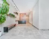 Welcome area with a chandelier and recessed lighting Welcome area with a chandelier and recessed lighting