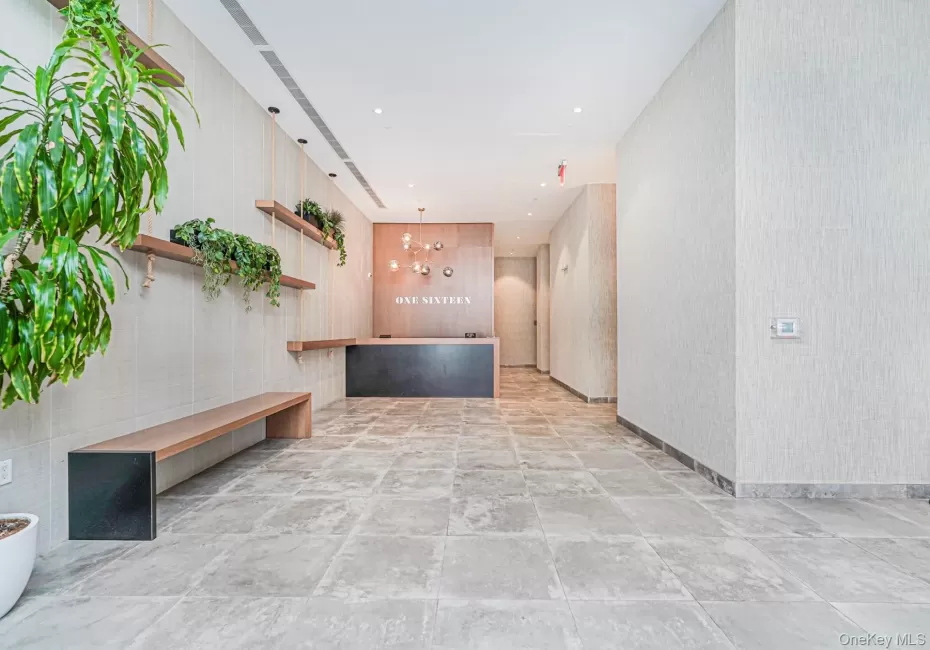 Welcome area with a chandelier and recessed lighting Welcome area with a chandelier and recessed lighting