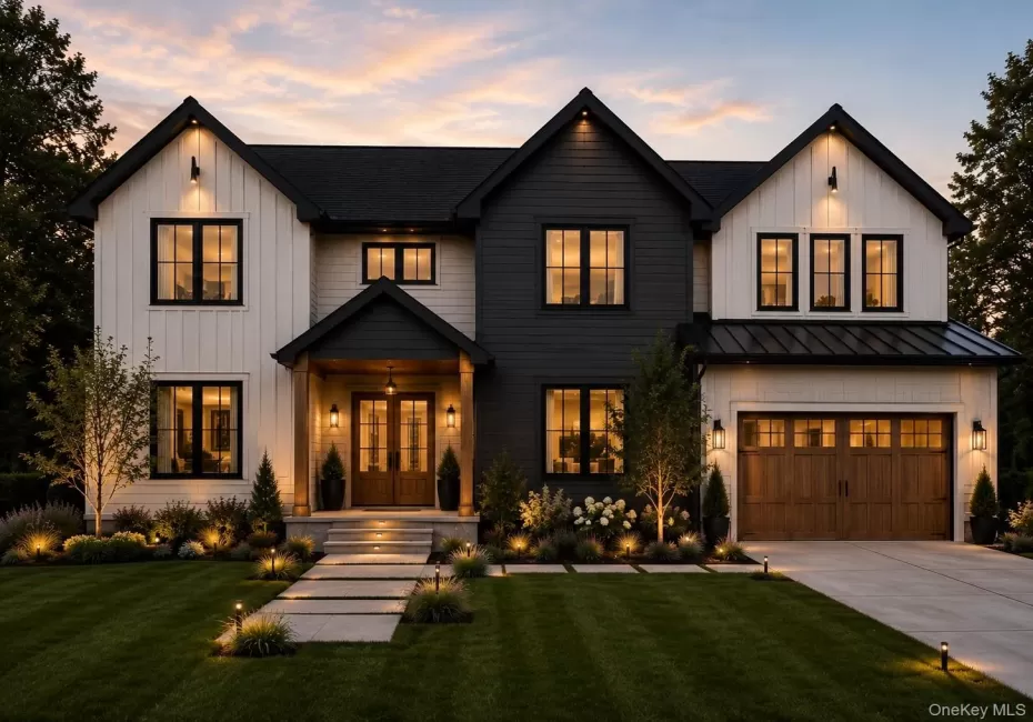 Modern farmhouse-style exterior featuring vertical board siding and dark horizontal siding accents Modern farmhouse-style exterior featuring vertical board siding and dark horizontal siding accents