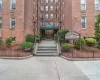 View of apartment building / complex featuring cooling unit View of apartment building / complex featuring cooling unit