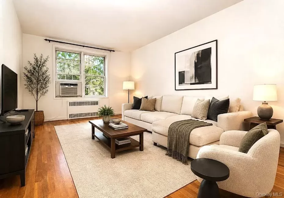 Photo Visually Staged.....Large living room opens to the dining foyer and is approx 19'-1" x 11'-11" plus the Dining area which is an additional 10'-0" x 14'-1" Photo Visually Staged.....Large living room opens to the dining foyer and is approx 19'-1" x 11'-11" plus the Dining area which is an additional 10'-0" x 14'-1"