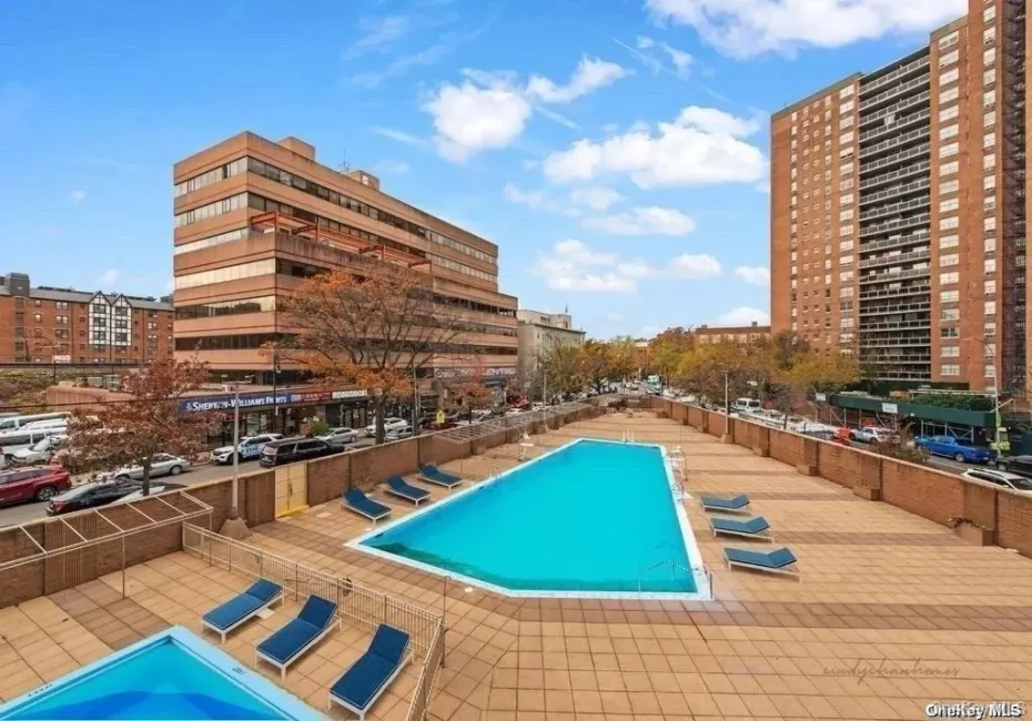 View of pool featuring a city view View of pool featuring a city view