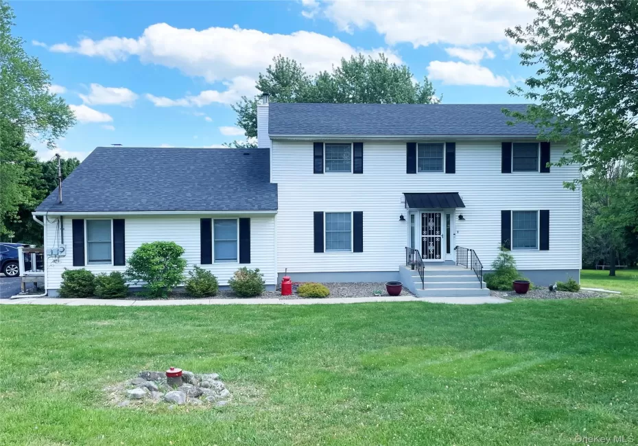 Classic center hall colonial including Guest Quarters with it's own entrance. Classic center hall colonial including Guest Quarters with it's own entrance.
