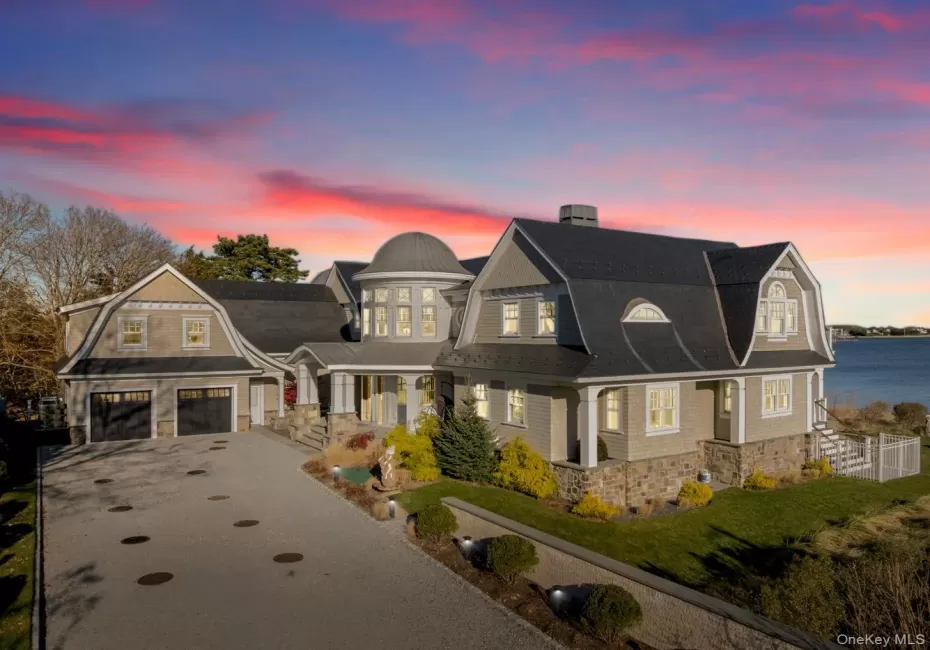 View of front of home featuring a gambrel roof, roof with shingles, and driveway View of front of home featuring a gambrel roof, roof with shingles, and driveway