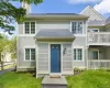 View of front of home with a chimney and a shingled roof View of front of home with a chimney and a shingled roof